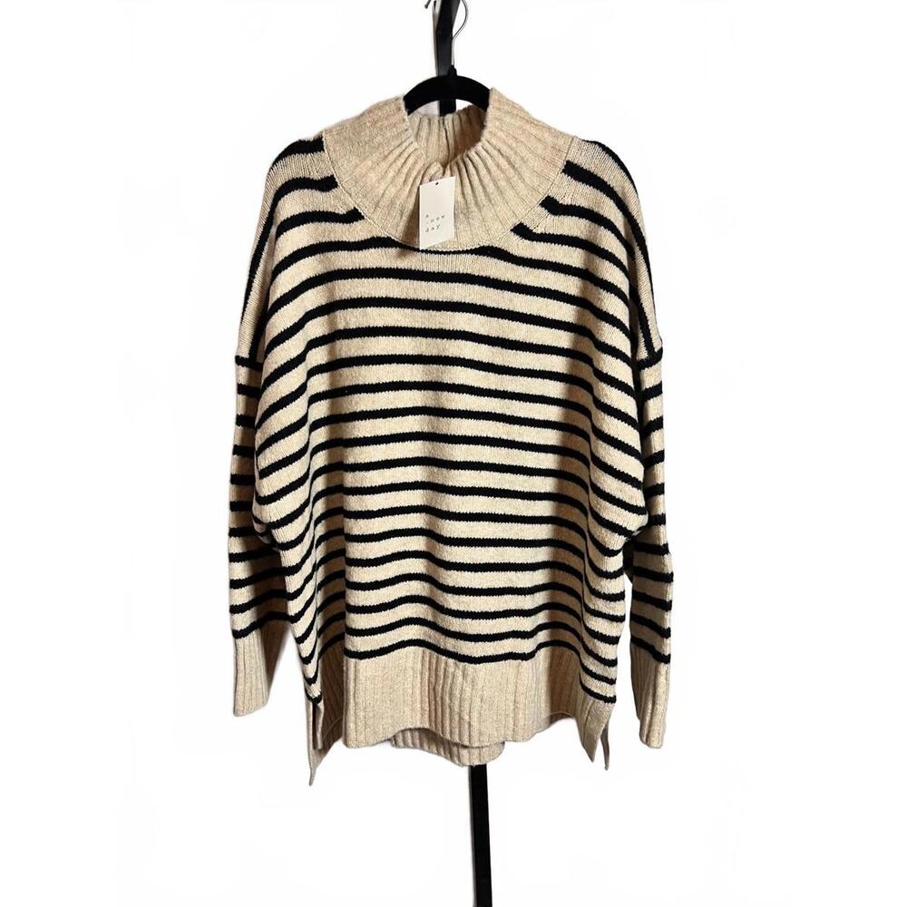 Striped Cream and Black Turtleneck Sweater